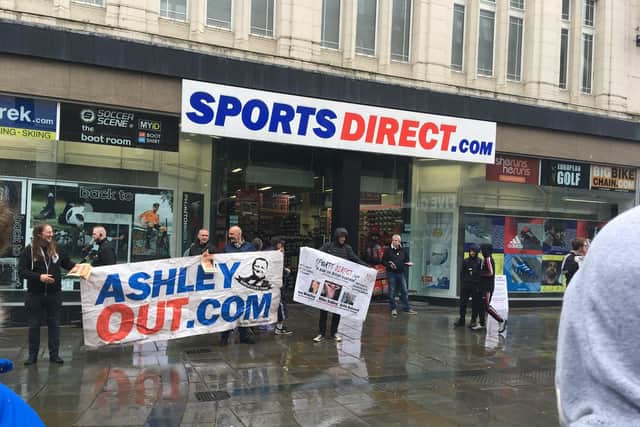 Newcastle fans outside Sports Direct.
