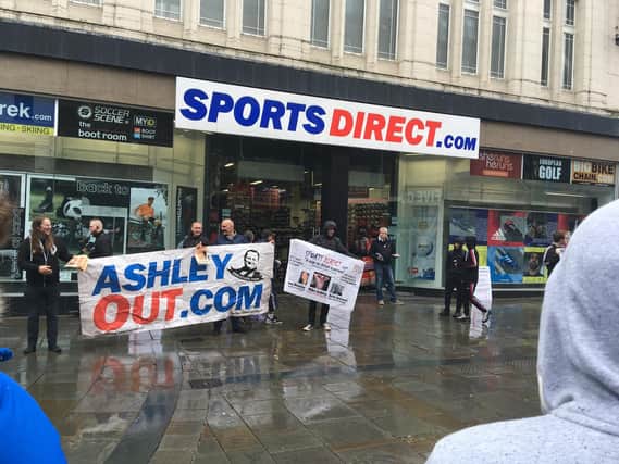 Newcastle fans outside Sports Direct.