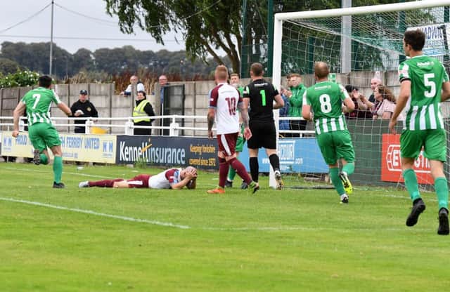 Gavin Cogdon holds his head in his hands after a chance went begging. All pictures by Kev Wilson.