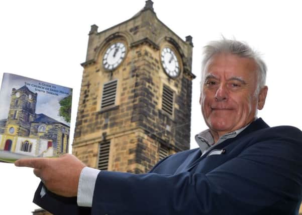 Alan Newham with his guide to St Hilda's Church.