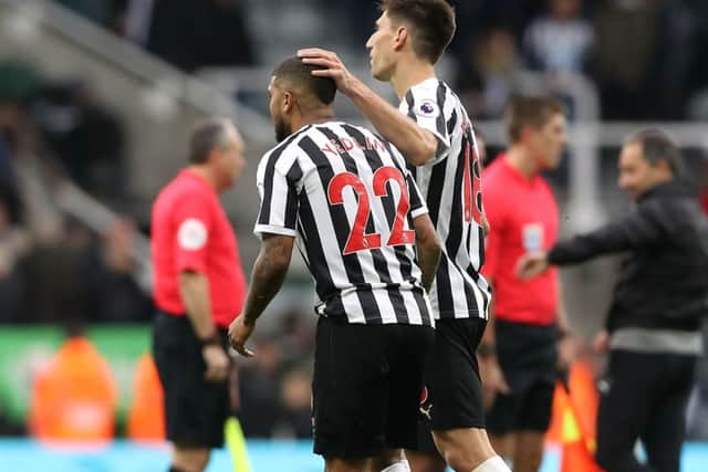 Newcastle Uniteds Federico Fernandez (right) and DeAndre Yedlin after the final whistle of the Chelsea game at St Jamess Park.