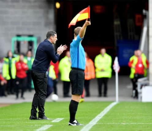 Jack Ross urges his players on.