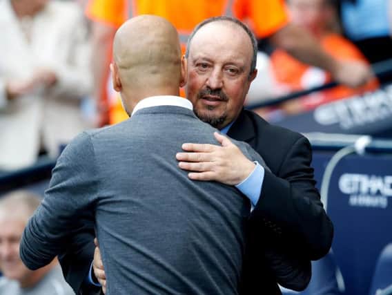 Manchester City manager Pep Guardiola (left) with Newcastle United manager Rafael Benitez before kick-off during the Premier League match at the Etihad Stadium, Manchester. PRESS ASSOCIATION