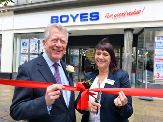 Chairman Andrew Boyes and store manager Jackie Ambler officially open Boyes store in King Street.