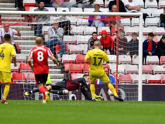 Sunderland keeper Jon McLaughlin saves a penalty.