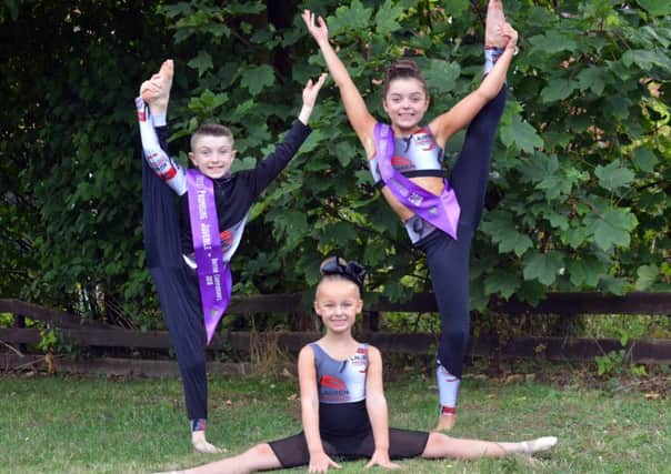 Lauren Anderson Academy of Dance champions from left, Max Walton, 9, Pixie Armstrong, 6 and Maisy Tomlin, 10.