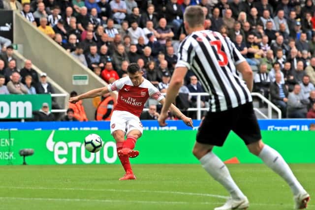 Arsenal's Granit Xhaka scores his side's first goal of the game at St James's Park.