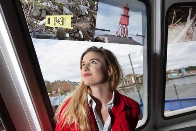 Jay Smith with her work inside the Shields Ferry.