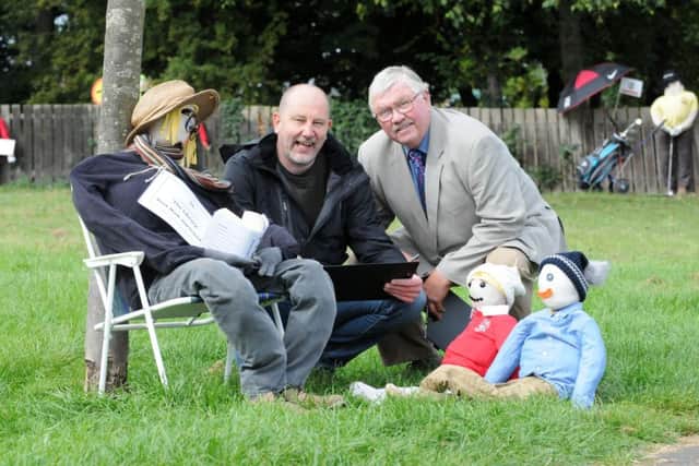 East Boldon's scarecrow competition judges Jim Cokill and Fred Rylance (R).