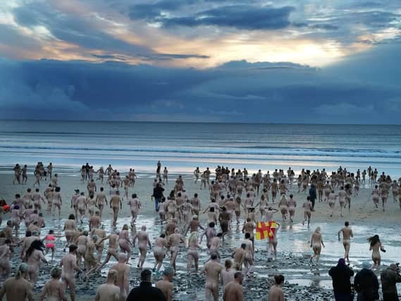 Hundreds of people took part in the North East Skinny Dip, which raises money for Mind. Pic: Owen Humphreys/PA Wire.