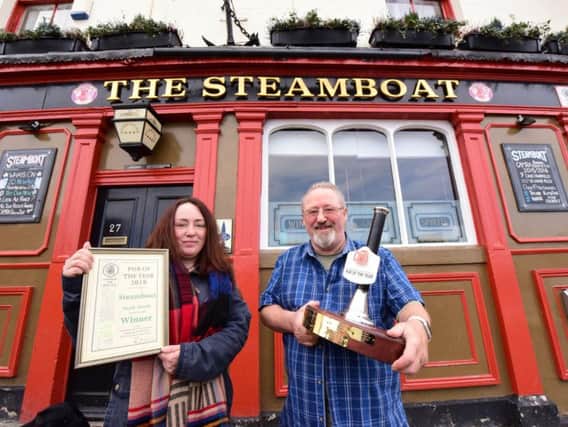 Steamboat bar manager Kathleen Brain and landlord Joe Mooney with their 2018 local Camra Pub of the Year award.
