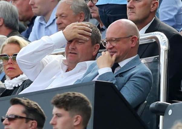 Lee Charnley and Mike Ashley.