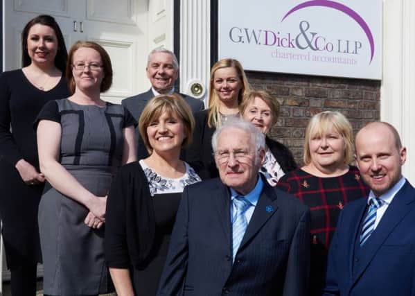 (Front L-R) Founding partner Bill  Dick with son and managing partner Andrew Dick along with their dedicated team of staff.