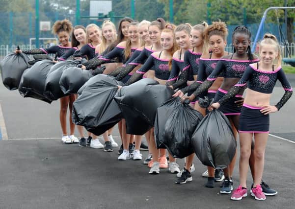 Champion cheerleaders will be cleaning up the beaches.