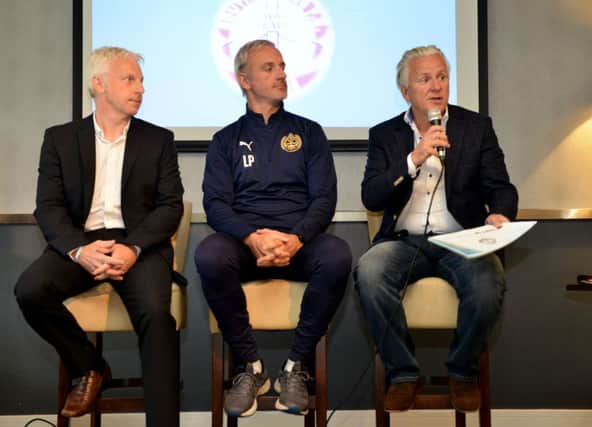 From left, Foundation chief Steve Camm, joint team manager Lee Picton and chairman Geoff Thompson on stage at South Shields FC at the launch of Project EFL.