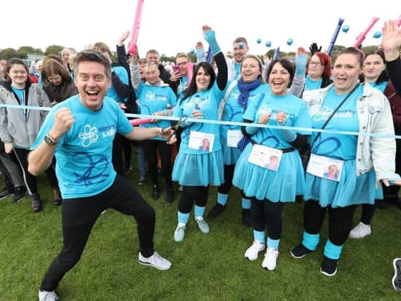 Richard McCourt gets the Memory Walk underway in Bents Park