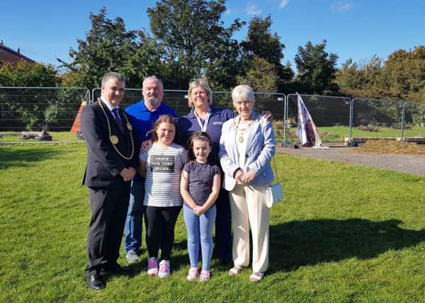 (Back) Suzanne Jackson from Waves, with Tonys daughter Summer Carlisle, 10, and Toni Carlisle, eight, 8, with the Mayor Ken Stephenson and Mayoress Cathy Stephenson.