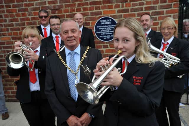 Deputy Mayor Coun Norman Dick with members of the Westoe Brass Band during the unveiling of the Blue Plaque at St Hildas Colliery.