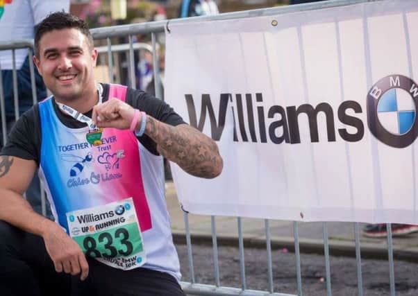 Aaron Parmar completes his 10k run in honour of Chloe Ruherford and Liam Curry