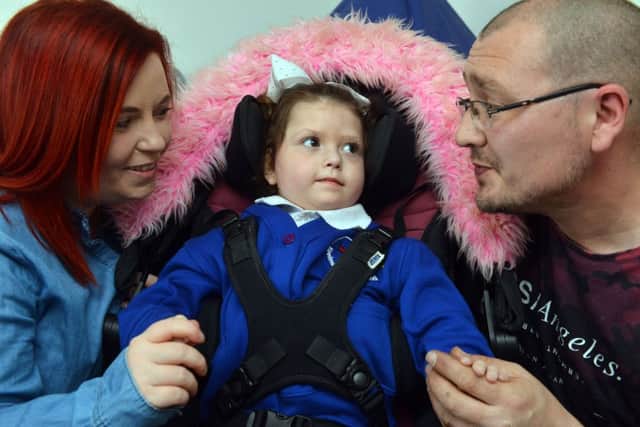 Jemma and Aaron Meek with daughter Lana, three, who has a rare genetic condition.