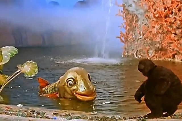 The giant fish and the bear in a scene from The Singing Ringing Tree.