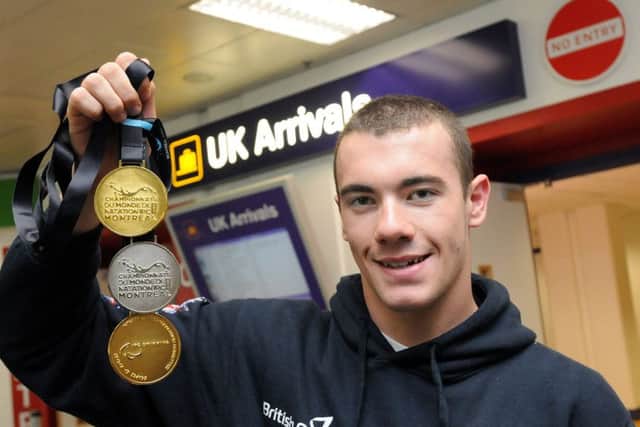 Triple medal winner Josef Craig and bronze medal winner Nicole Lough return home from  IPC World Championships in Canada.
