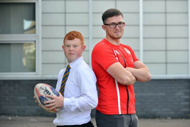 Former Whitburn C of E Academy pupil and Wales rugby player James McGurk vists pupil and Newcastle Thunder U14 rugby player Ryan Crossley