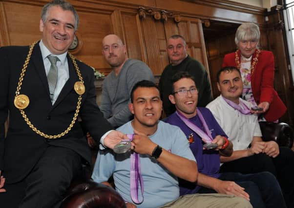 South Tyneside Ability Football Team, players and coaches, Shaun Clark, Daniel Bettencourt, David Spraggon, Justin Laidler and Matthew Lowe, meeting the Mayor Coun Ken Stephenson and Mayoress Mrs Cathy Stephenson, at South Shields Town Hall.
