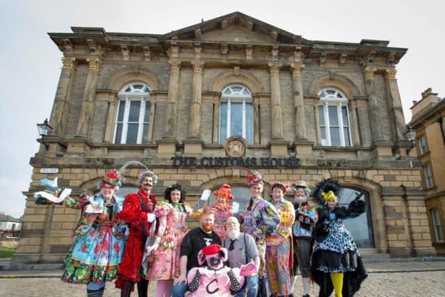 The cast of Beauty and the Beast with designers Paul Shriek and Matt Fox outside of The Customs House in South Shields.