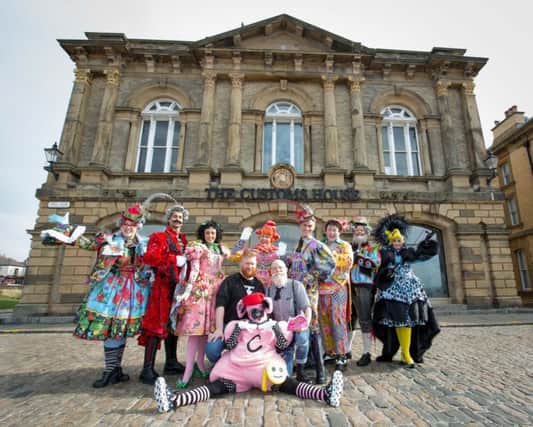 The cast of Beauty and the Beast with designers Paul Shriek and Matt Fox outside of The Customs House in South Shields.