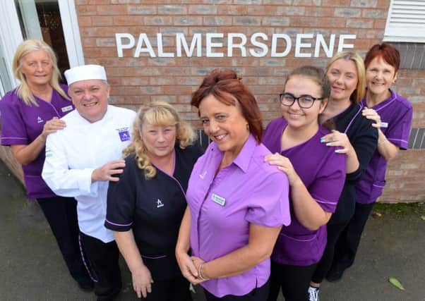 Palmersdene Care Home manager Maureen McCulloch with her staff.