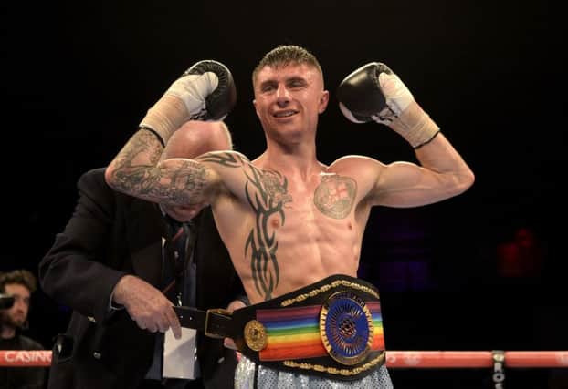 Anthony Nelson celebrates wining the Commonwealth Super Flyweight  title against Jamie Wilson.