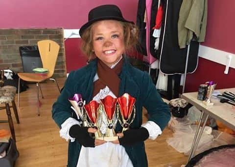 Champion performer with a raft of trophies, Evie-Mai Davis.