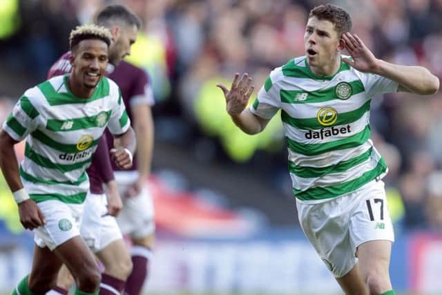 Celtic's Ryan Christie celebrates scoring their third goal against Heart of Midlothian during the Betfred Cup semi final match at BT Murrayfield Stadium.