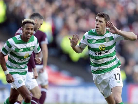 Celtic's Ryan Christie celebrates scoring their third goal against Heart of Midlothian during the Betfred Cup semi final match at BT Murrayfield Stadium.