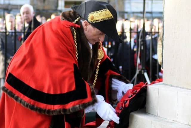 The former  Mayor of South Tyneside, Coun Alan Smith, lays a wreath at Westoe war memorial. Pic: Craig Leng.