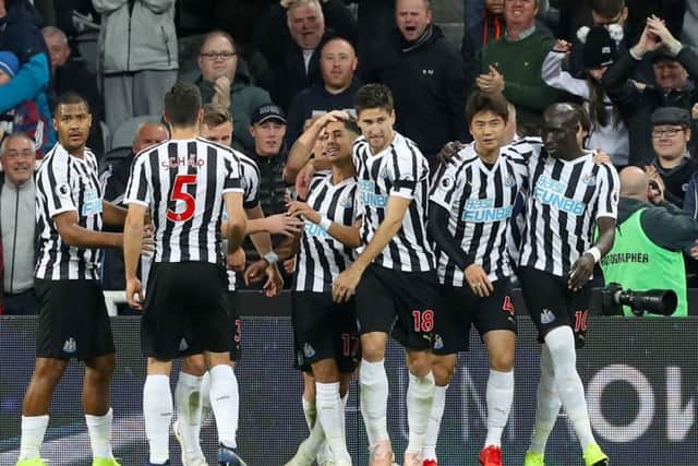 Ki Sung-yueng joins in the celebrations with Ayoze Perez, centre.