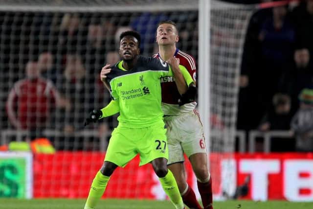 Divock Origi playing for Liverpool.
