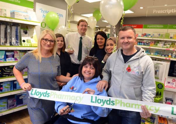 Lisa Rutherford officially opens the new Lloyds Pharmacy, New George Street after renovation with husband Mark and Pharmacy manager Sheila Robson