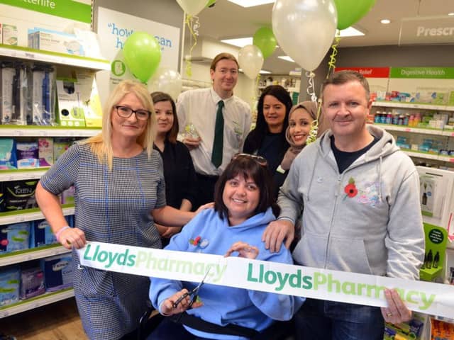 Lisa Rutherford officially opens the new Lloyds Pharmacy, New George Street after renovation with husband Mark and Pharmacy manager Sheila Robson
