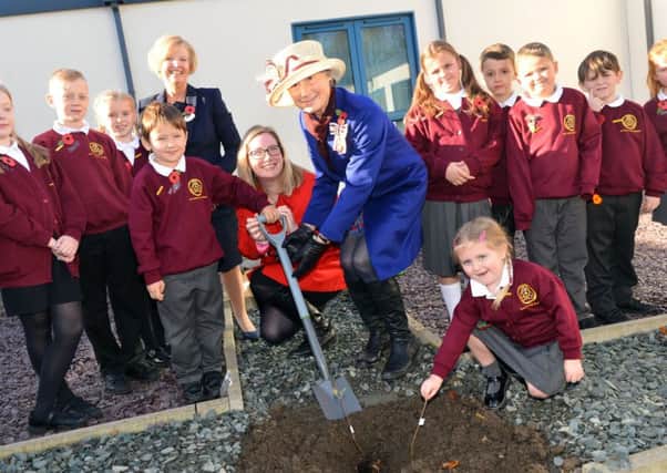 Susan Winfield Lord Lieutenant and Emma Lewell-Buck South Shields MP plant Her Majesty The Queen seedling at Holy Trinity Primary School