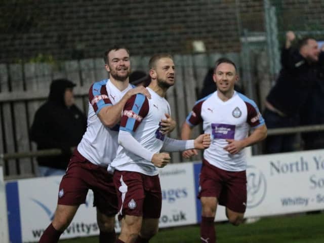 Craig Baxter celebrates his winner.