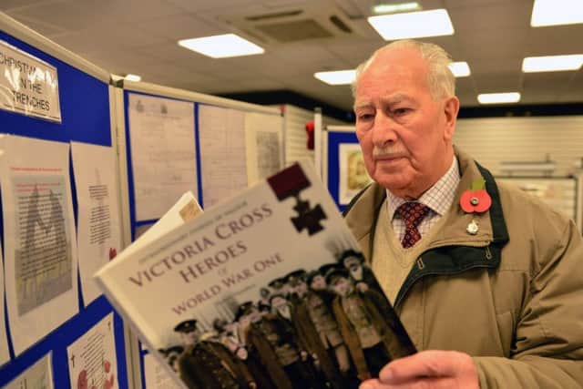 Former Royal Army Pay Corps Albert Phipps (88) reading one of the books on display at the Jarrow and Hebburn Local History Society exhibition.