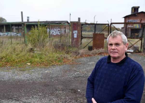 Bill Coats standing on the land that is awaiting planning permission. Picture by FRANK REID