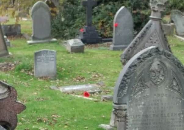 Poppies have been placed on the graves of soldiers killed in the First World War