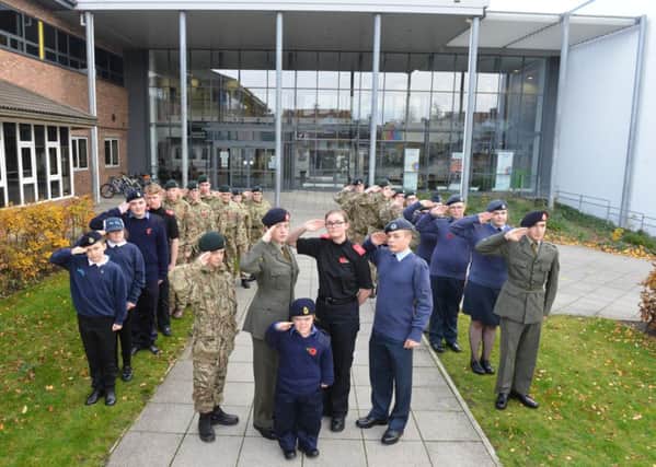 Mortimer Community College students in full cadet uniform for remembrance service