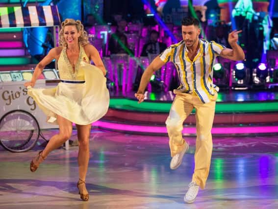 Faye Tozer and Giovanni Pernice perform their jive