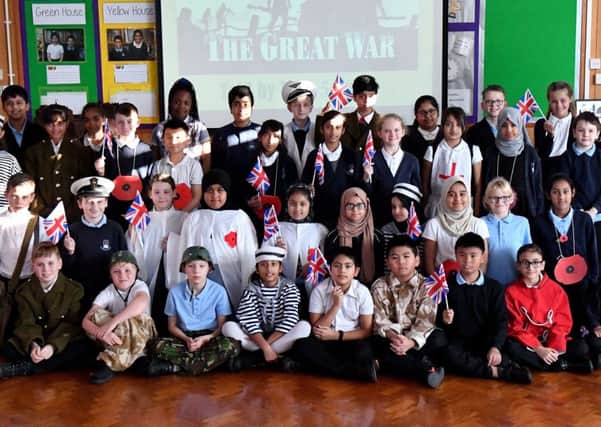 Pupils from Year 5 and 6 who took part in the Remembrance event at Laygate Community School. Picture by FRANK REID