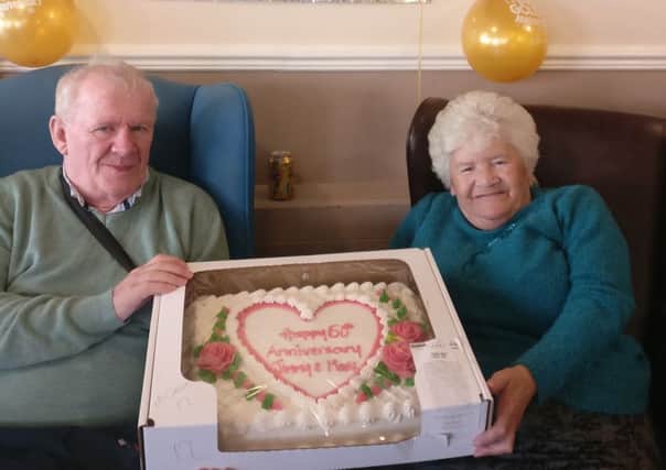 Mary and Jimmy Collins were given a cake to mark their Golden Wedding Anniversary.