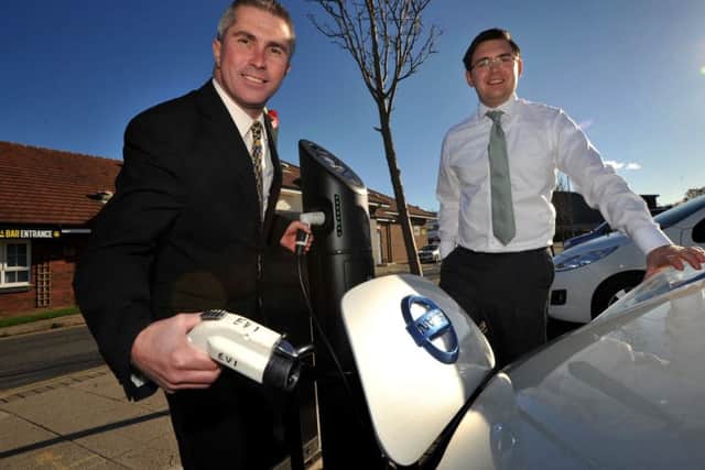 Coun Mark Walsh, left, at the new electric car charging post at Boldon Community Association with Jonathan Barlow.